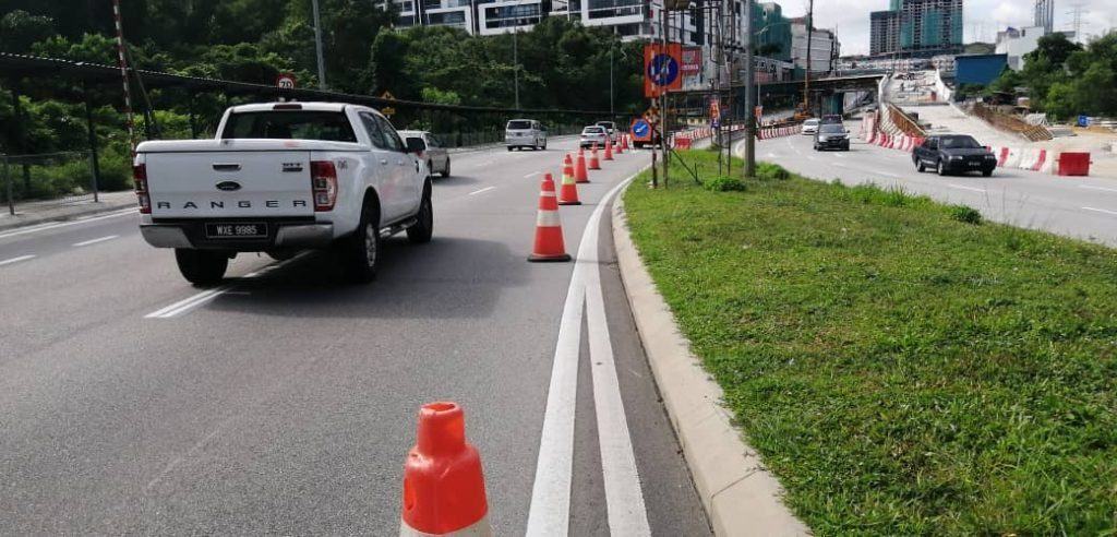 road construction highway Malaysia traffic cones lane separation road works